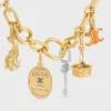 CELINE Charms Triomphe, Emaye ve Pirinç, Altın Kaplama CELINE Charms Triomphe, Emaye ve Pirinç, Altın Kaplama