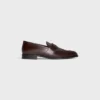 CELINE Malaquais Penny Triomphe Loafer, Parlak Boğa Derisi CELINE Malaquais Penny Triomphe Loafer, Parlak Boğa Derisi