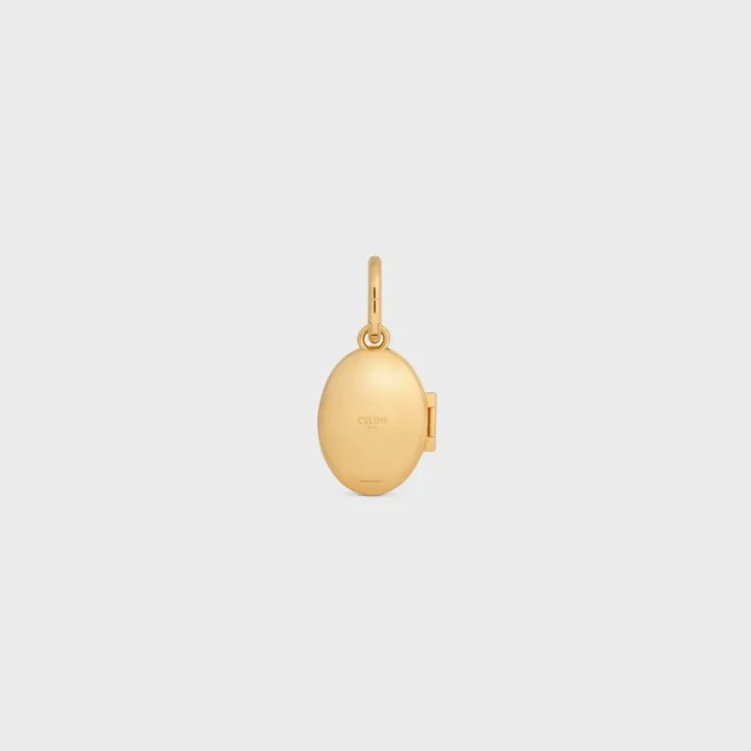 Charms Elephant Locket, altın kaplama pirinç, emaye ve çelik Charms Elephant Locket, altın kaplama pirinç, emaye ve çelik