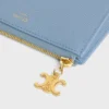 Üçlü Kese Seti Triomphe Canvas ve Damarlı Dana Derisi Triomphe Charms Üçlü Kese Seti Triomphe Canvas ve Damarlı Dana Derisi Triomphe Charms