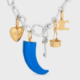 Reçine, Deri ve Pirinçten Yapılmış, Altın Kaplamalı Küçük Boynuz Şeklinde Charms Reçine, Deri ve Pirinçten Yapılmış, Altın Kaplamalı Küçük Boynuz Şeklinde Charms