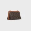 Triomphe Canvas ve Kuzu Derisinden Zincirli Clutch Triomphe Canvas ve Kuzu Derisinden Zincirli Clutch