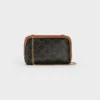 Triomphe Canvas ve Kuzu Derisinden Zincirli Clutch Triomphe Canvas ve Kuzu Derisinden Zincirli Clutch